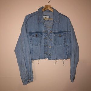 Distressed cropped jean jacket, size medium but fits like a large
